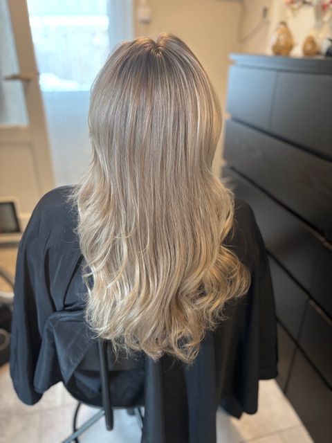 Blonde balayage met losse golven